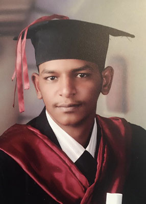 Portrait of my late cousin, Moayyad Ibrahim Mohammad Musa, who is pictured wearing a cap and gown for his college graduation. Moayyad died in the summer of 2023 while desperately trying to escape the raging conflict in Sudan. Portrait of my late cousin, Moayyad Ibrahim Mohammad Musa, who is pictured wearing a cap and gown for his college graduation. Moayyad died in the summer of 2023 while desperately trying to escape the raging conflict in Sudan.